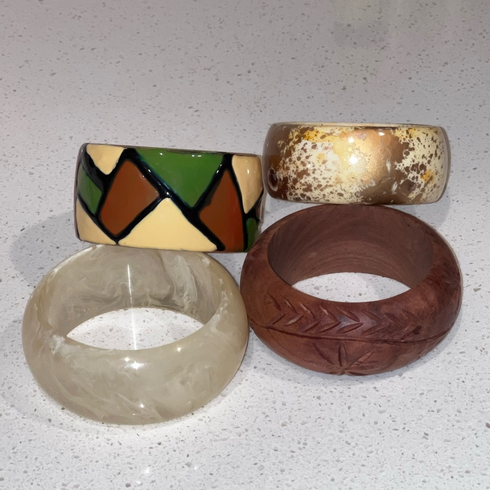 Collection of 4 wide fashion bangle bracelets